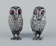 L'Art presents: 
Edward 
Charles Brown
Rare set of 
salt and pepper 
shakers shaped 
like owls with 
inserted red 
...