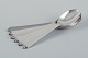 L'Art presents: 
Georg 
Jensen Pyramid.
A set of six 
dinner spoons.