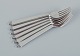 L'Art presents: 
Georg 
Jensen Pyramid. 

A set of six 
dinner forks.