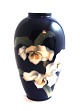 Lundin Antique 
presents: 
Royal 
Copenhagen. 
Vase with 
floral motif. 
Model 1886-47C. 
Height 18.5 cm. 
(1 quality)