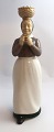 Lundin Antique 
presents: 
Bing & 
Grondahl. 
Porcelain 
figure. The 
woman with the 
eggs. Model 
2126. Height 22 
cm. ...