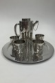 Danam Antik 
presents: 
Georg 
Jensen Sterling 
Silver Cocktail 
Shaker, Tray og 
Cups No. 819