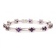 Aabenraa 
Antikvitetshandel 
presents: 
18kt white 
gold bracelet 
wit 11 amethyst 
and 44 diamonds 
of ca. 0,03ct 
...