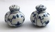 Lundin Antique 
presents: 
Royal 
Copenhagen. 
Blue fluted, 
half lace. Salt 
& pepper 
shakers. Model 
712 & 711. ...