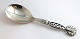 Lundin Antique 
presents: 
Georg 
Jensen. 
Sterling (925). 
Serving spoon. 
Design 83. 
Length 24 cm. 
Produced in 
1927.