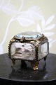 K&Co. presents: 
Antique 
French jewelry 
box in bronze 
with faceted 
glass and silk 
cushion at the 
bottom and with 
...