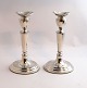 Lundin Antique 
presents: 
Hugo Grün, 
Copenhagen. 
Silver 
candlesticks 
(830). A pair. 
Height 19 cm. 
Produced 1961.