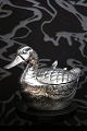 K&Co. presents: 
Delicious 
Italian ice 
bucket designed 
by Mauro 
Manetti in the 
shape of a duck 
in 
silver-plated 
...