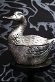 K&Co. presents: 
Delicious 
Italian ice 
bucket designed 
by Mauro 
Manetti in the 
shape of a duck 
in 
silver-plated 
...