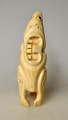 Pegasus – Kunst 
- Antik - 
Design 
presents: 
Tupilak, 
carved tooth, 
20th century, 
Greenland.