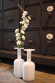 K&Co. presents: 
Otto 
Brauer white 
glass vase. 
Holmegaard.
H: 23.5cm...