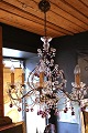 K&Co. presents: 
Old French 
prism 
chandelier, 
decorated with 
violet glass 
drops and lots 
of clear glass 
chains...