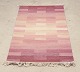 L'Art presents: 
Swedish 
textile 
designer.
Handwoven 
“Terass” rug in 
wool. Rölakan 
technique.