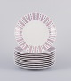 L'Art presents: 
Gunnar 
Nylund for 
Rörstrand. A 
set of eleven 
"Casino" 
dessert plates.
