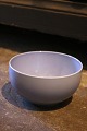 K&Co. presents: 

Royal 
Copenhagen 4 
All Seasons 
faience bowl 
with blue glaze 
designed by 
Grethe Meyer. 
No.575...