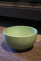 K&Co. presents: 

Royal 
Copenhagen 4 
All Seasons 
faience bowl 
with green 
glaze designed 
by Grethe 
Meyer. No. 
575...