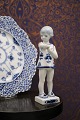 K&Co. presents: 

Royal 
Copenhagen, 
small Blue 
Fluted girl 
with butterfly. 

1/4795...