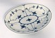 Lundin Antique 
presents: 
Royal 
Copenhagen. 
Mussel painted, 
fluted. Oval 
salad dish. 
Model 24. 
Length 25 cm. 
...