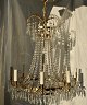 Pegasus – Kunst 
- Antik - 
Design 
presents: 
Large 
chandelier, 
brass with 744 
prisms, 20th 
century.