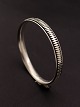 Middelfart 
Antik presents: 
Hans 
Hansen sterling 
silver bangle 
#200