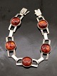 Middelfart 
Antik presents: 
N E From 
sterling silver 
bracelet with 
amber