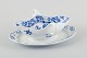 L'Art presents: 
Meissen, 
Germany. Blue 
Onion porcelain 
gravy boat with 
two handles on 
a foot.
