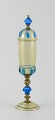 L'Art presents: 
Murano, 
Italy. Large 
lidded vase 
made of blue 
and smoky art 
glass.