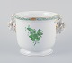 L'Art presents: 
Herend, 
Hungary. 
Chinese Bouquet 
Apponyi Green, 
porcelain 
flowerpot. 
Handles in the 
shape of rams.