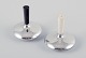 L'Art presents: 
Cohr salt 
and pepper 
shakers in 
silver plate.