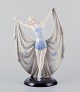 L'Art presents: 
Keramos, 
Austria. Large 
ceramic Art 
Deco sculpture 
of female 
dancer on 
plinth.