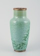 L'Art presents: 
Unknown 
French 
ceramicist.
Vase of 
stoneware. 
Crystal glaze 
in green tones.