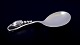 L'Art presents: 
Georg 
Jensen Blossom. 
Compote spoon 
in sterling 
silver.