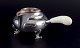 L'Art presents: 
Georg 
Jensen Blossom 
creamer in hand 
hammered 
sterling silver 
with bone 
handle.