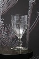 K&Co. presents: 
Old French 
souvenir wine 
glass with 
engraved 
writing and 
decorations. 
"Souvenir de la 
feté"