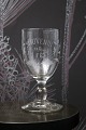 K&Co. presents: 
Old French 
souvenir wine 
glass with 
engraved 
writing and 
decorations. 
"Souvenir de la 
feté"