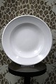 K&Co. presents: 
Royal 
Copenhagen deep 
plate in white 
hotel porcelain 
/ iron 
porcelain.
Dia.: 
23.5cm...