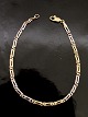 Middelfart 
Antik presents: 

14 carat 
red and white 
gold bracelet