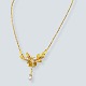 Antik 
Damgaard-
Lauritsen 
presents: 
Jean 
Larsen; A 
necklace of 18k 
gold set with 
pearls
