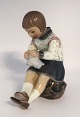 Lundin Antique 
presents: 
Dahl 
Jensen. 
Porcelain 
figure. Grethe 
with knitting 
clothes. Model 
1197. Height 
14.5 ...