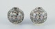 L'Art presents: 
Jean 
Gerbino for 
Vallauris, 
French 
ceramicist.
A pair of 
small round 
stoneware 
vases.