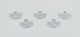 L'Art presents: 
Just 
Andersen, a set 
of five pewter 
glass trays.