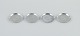 L'Art presents: 
Just 
Andersen, a set 
of four pewter 
glass trays.
Grooved edge. 
With incised 
motifs from 
fairy ...