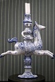 K&Co. presents: 
Bjørn 
Wiinblad 
ceramic 
candlestick 
with fine blue 
glaze of a 
knight on 
horseback...