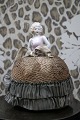K&Co. presents: 
Decorative, 
old half-doll 
in porcelain 
from the 1930s 
with a fine 
fabric dress. 
(Pincushion)...