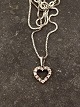 Middelfart 
Antik presents: 
14 carat 
white gold 
heart pendant 
with several 
diamonds