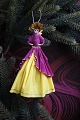 K&Co. presents: 
Old 
Christmas tree 
ornament, nice 
lady made of 
colored crepe 
paper...