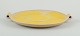 L'Art presents: 
Finnish 
ceramic dish in 
Art Deco style. 
With two 
handles.
Yellow glaze. 
Hand painted.