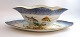 Lundin Antique 
presents: 
Royal 
Copenhagen. 
Fish set No.19. 
Model 3003. 
Sauce bowl. 
Length 26 cm. 
Produced ...