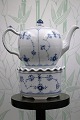 K&Co. presents: 
Royal 
Copenhagen, 
Blue Fluted tea 
warmer. 
RC# 1/9787...