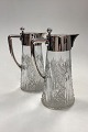 Danam Antik 
presents: 
A pair of 
Hespe Glass 
Carafes with 
silver 
mountings